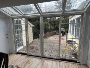 Infinity by Marvin - Cuatom Quad Sliding Patio Door Center Operating Sashes 18 Lite Contour Grids White - Princeton NJ