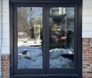Infinity by Marvin - Double Outswing French Door Grids Between the Glass - Titusville